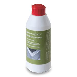 Flasche mit rotem Deckel, Steht. Text: '*gartenmetall®* EDELSTAHL-PFLEGE Für die regelmäßige Pflege, reinigt, entfernt hartnäckige Verfärbungen.' Kontext: Auf einem weißen Hintergrund platziert.