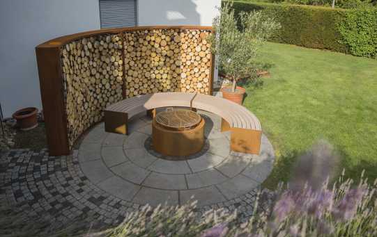 LIGNA firewood rack now also available in a curved design